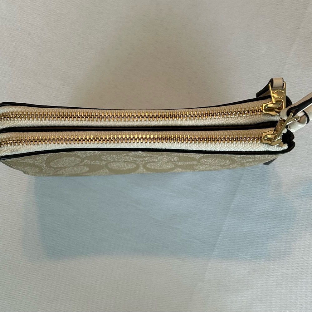 Coach Signature Double Zipper Wristlet in Tan and White with gold trim. - Picture 5 of 5